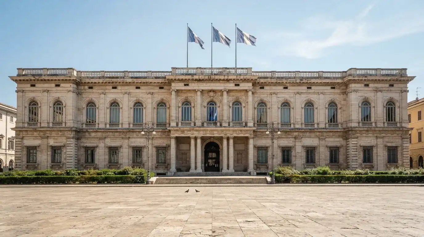 Palazzo istituzionale con bandiere al vento in una piazza soleggiata — casino online italiani senza autoesclusione